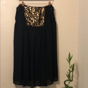 Black and gold sequined dress